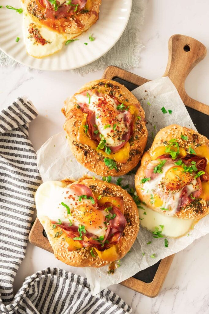 Hearty Breakfast Bagel with Egg, Prosciutto, and Garlic Butter