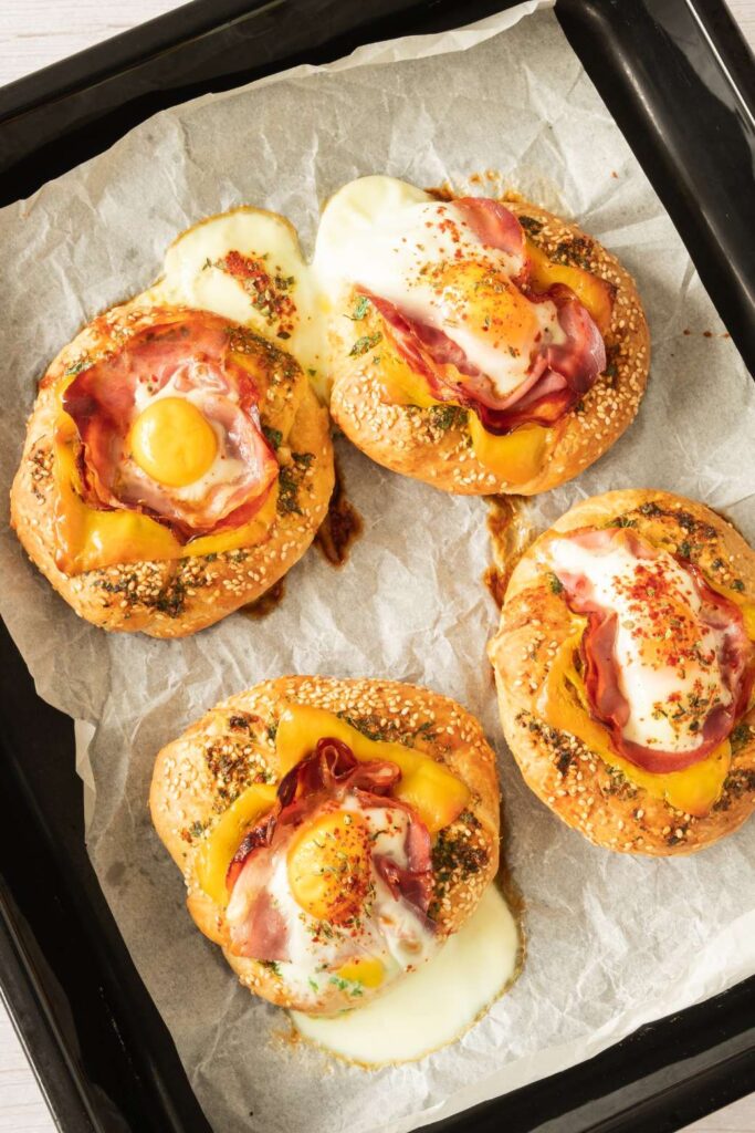 Hearty Breakfast Bagel with Egg, Prosciutto, and Garlic Butter