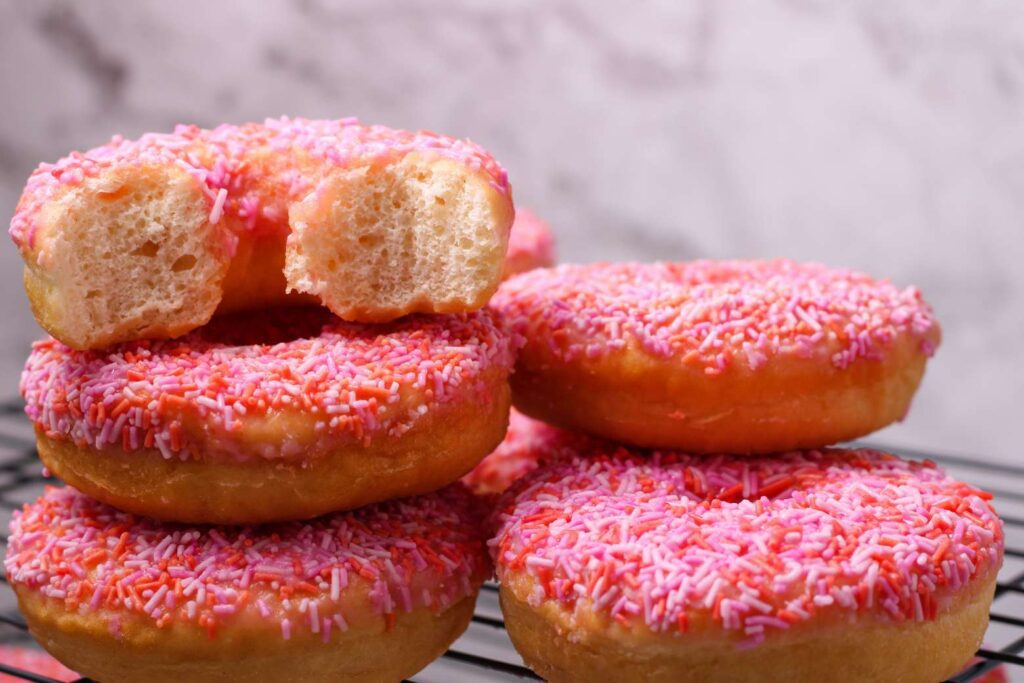 Homemade pink and orange donuts













