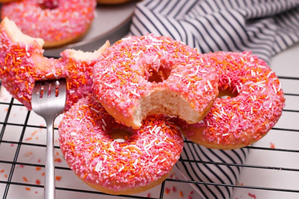 Homemade pink and orange donuts