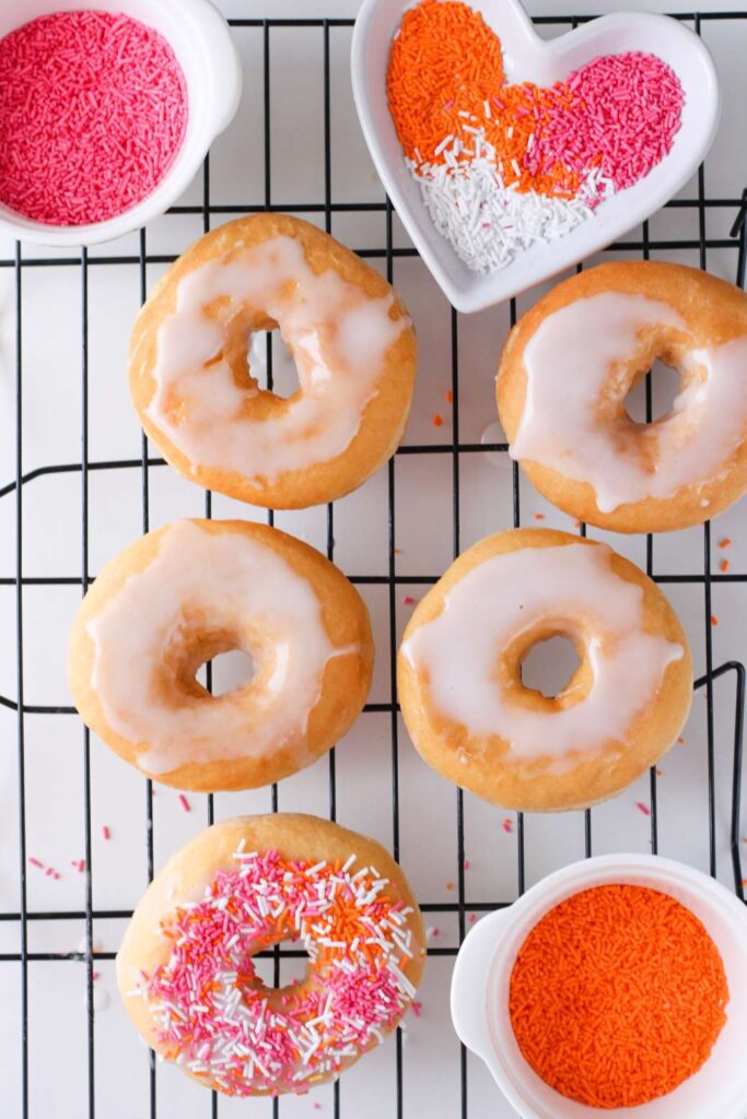 Homemade pink orange donuts